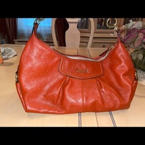 orange leather coach bag